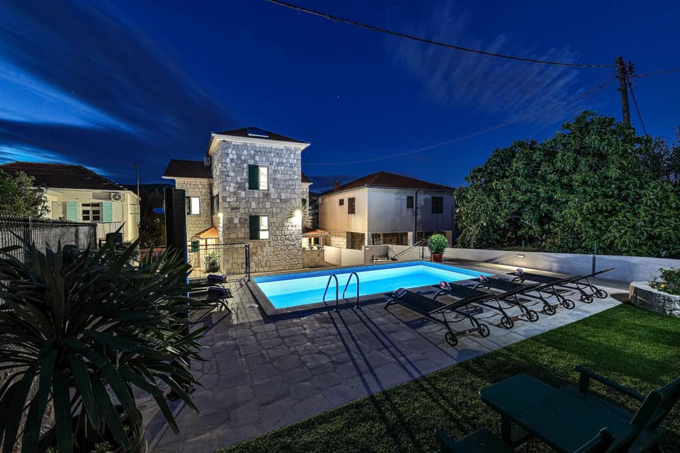 The pool lit at night