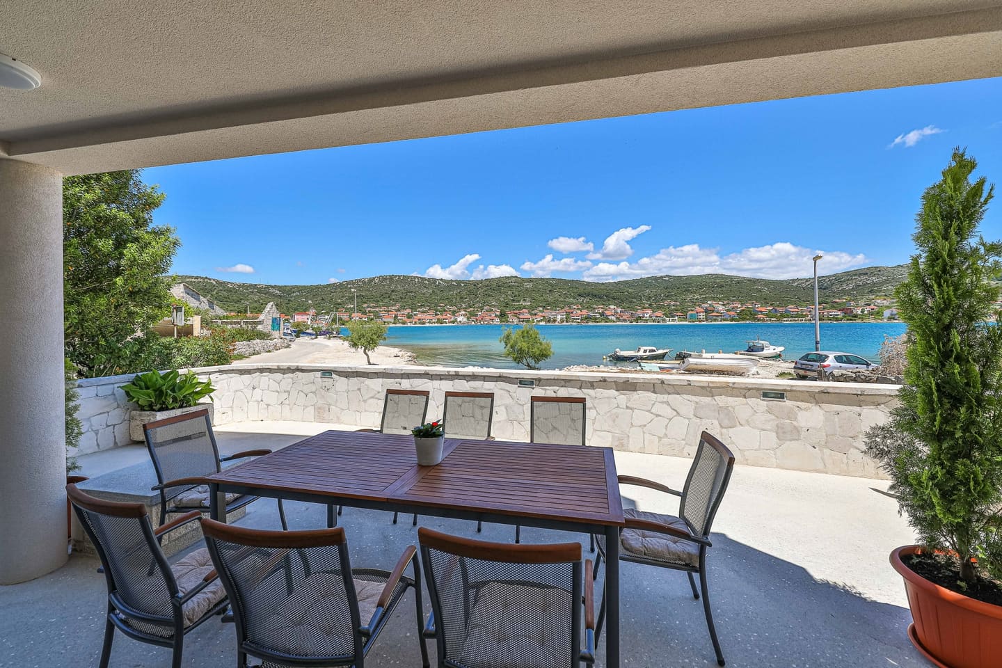Terrace dining table overlooking the bay